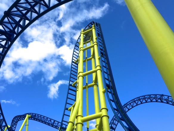 The ride fences do allow you to get under the tower helix in the back near the road.